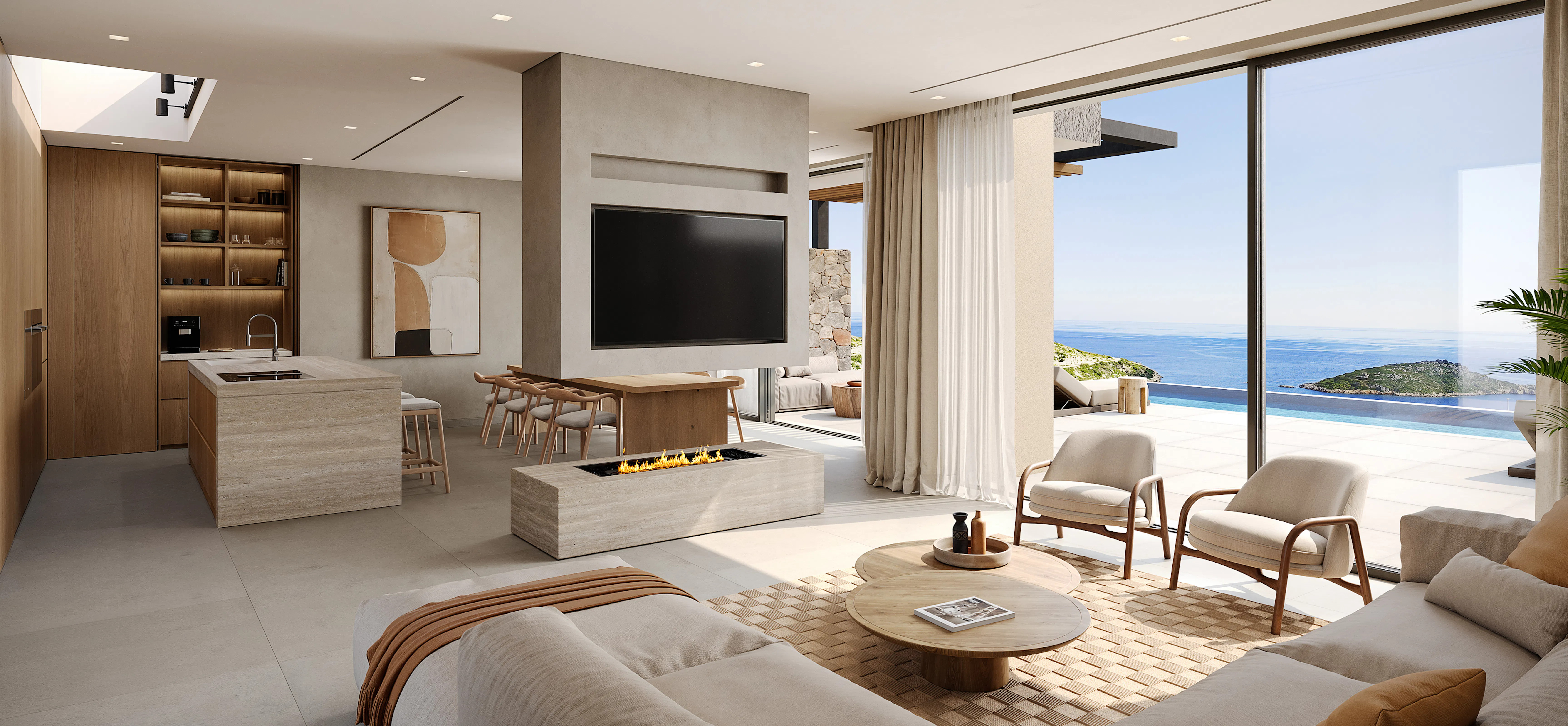 Open-plan living and dining space with a suspended fireplace and TV column, travertine kitchen island, and floor-to-ceiling sliding doors opening to a sea-view terrace.