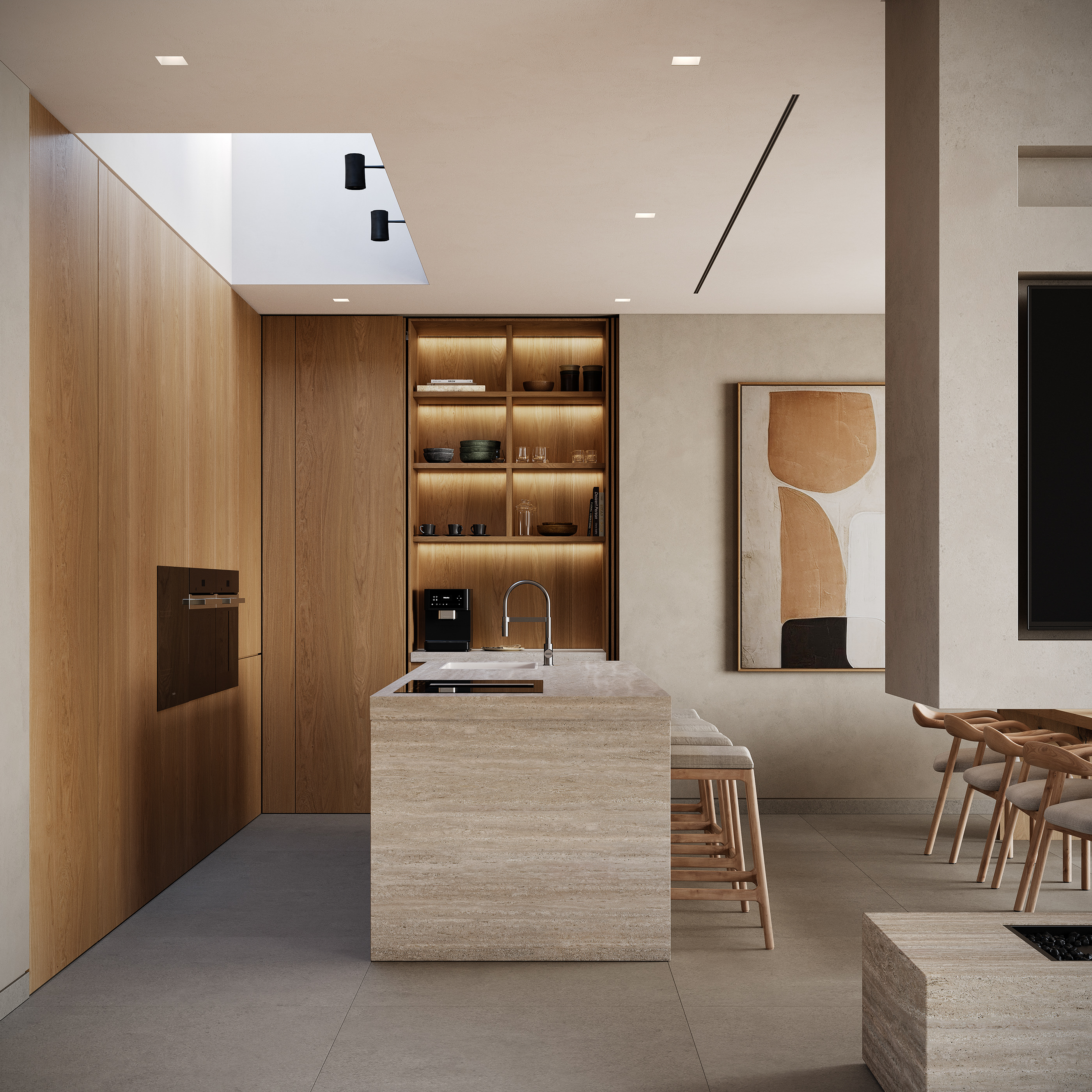 Kitchen area with a travertine island, built-in wood shelving with lit display niches, and a skylight above, opening into a dining space with abstract artwork.
